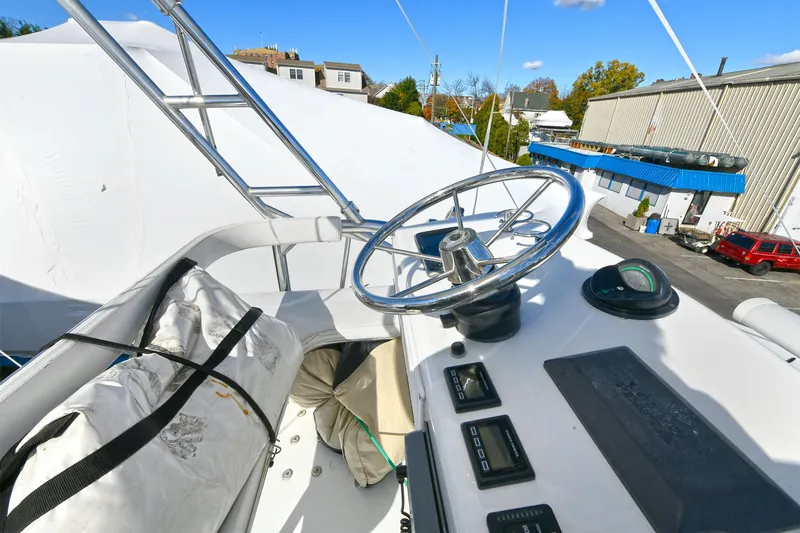 Two & Five Yacht Photos Pics 2013 Albemarle 360 Express Fisherman helm with steering wheel and controls.