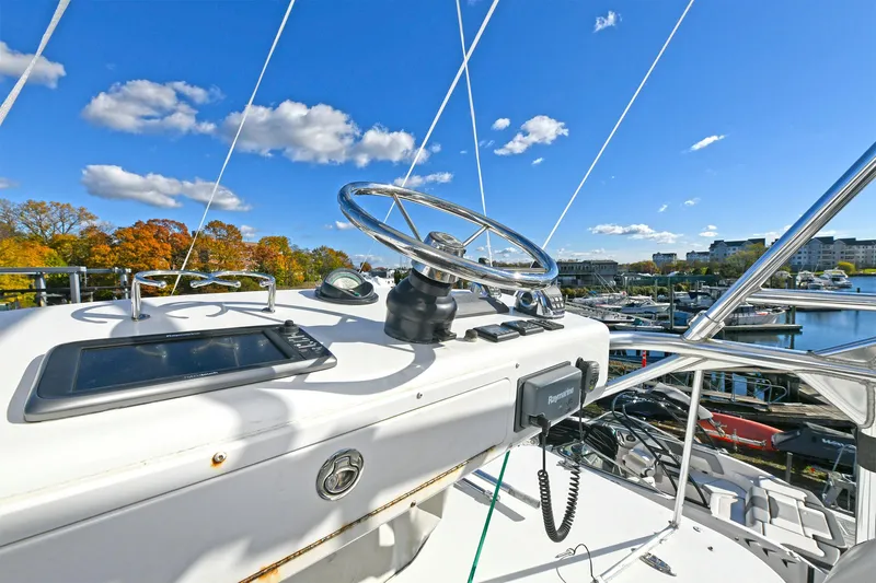 Two & Five Yacht Photos Pics 2013 Albemarle 360 Express Fisherman helm with marina view under clear blue sky.