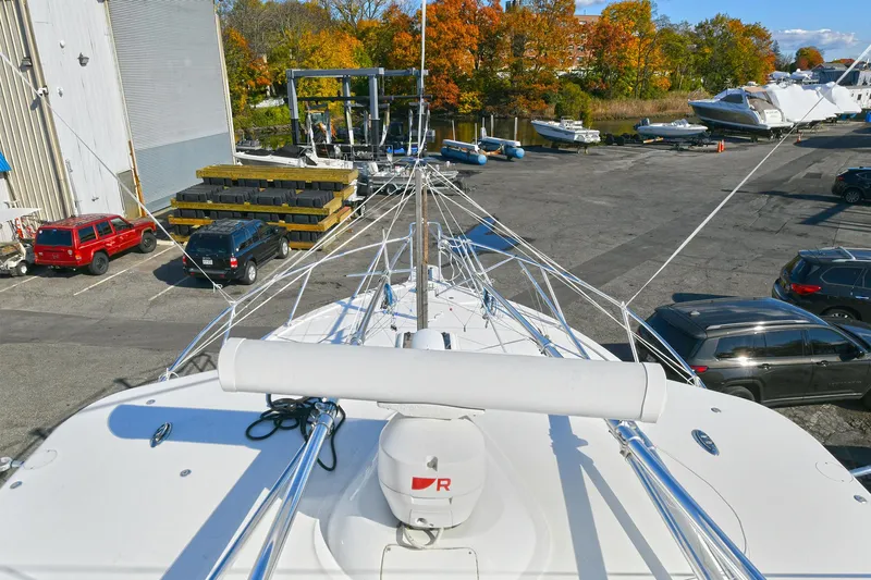 Two & Five Yacht Photos Pics 2013 Albemarle 360 Express Fisherman boat docked in a marina with autumn foliage.