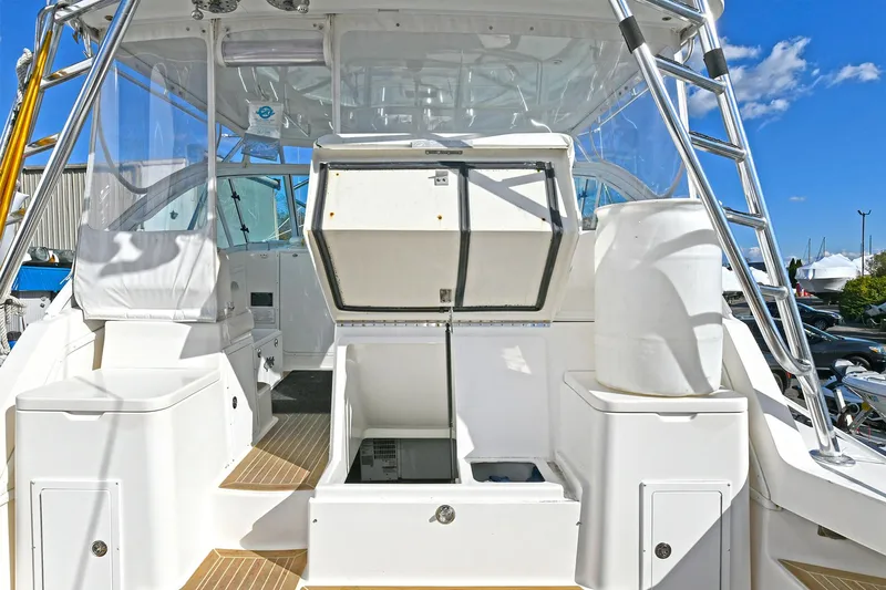 Two & Five Yacht Photos Pics 2013 Albemarle 360 Express Fisherman boat interior with open storage compartments.