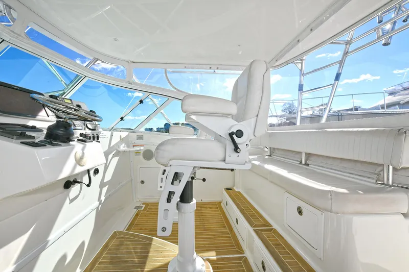 Two & Five Yacht Photos Pics 2013 Albemarle 360 Express Fisherman interior with helm and seating area.