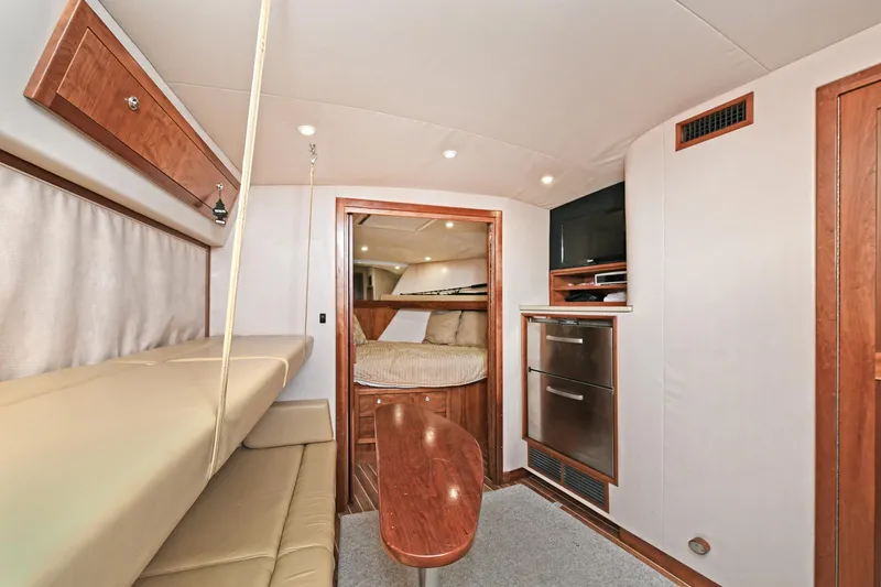 Two & Five Yacht Photos Pics Interior of 2013 Albemarle 360 Express Fisherman, featuring cozy seating and modern amenities.