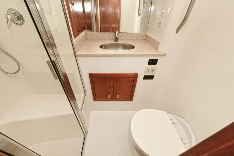 Two & Five Yacht Photos Pics 2013 Albemarle 360 Express Fisherman bathroom with shower, sink, and toilet.
