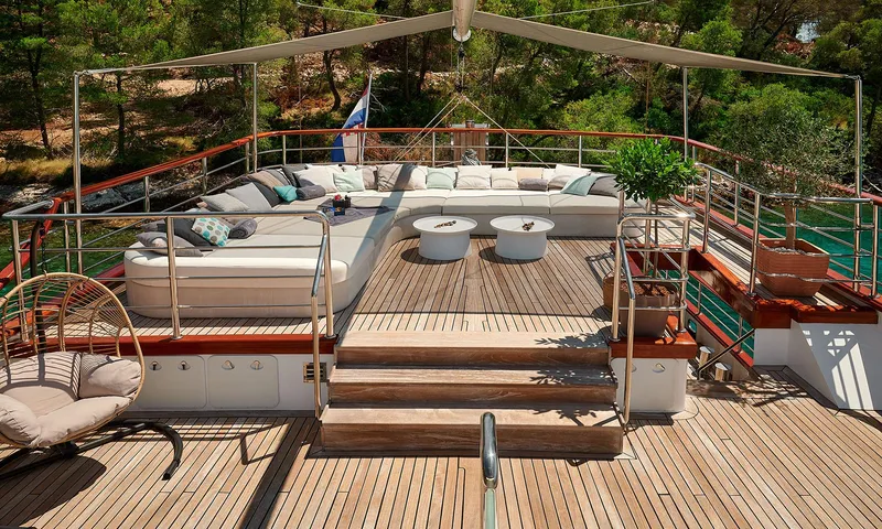Corsario Yacht Photos Pics Luxurious deck of 2019 Custom RADEŽ d.d. Schooner with plush seating and scenic views.