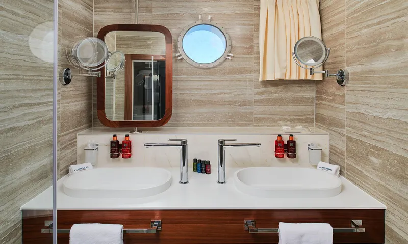 Corsario Yacht Photos Pics Luxurious bathroom on 2019 Custom RADEŽ d.d. Schooner with double sinks and modern fixtures.