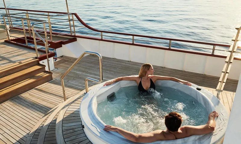 Corsario Yacht Photos Pics Couple relaxing in hot tub on RADEŽ d.d. Schooner, 2019, with ocean view.