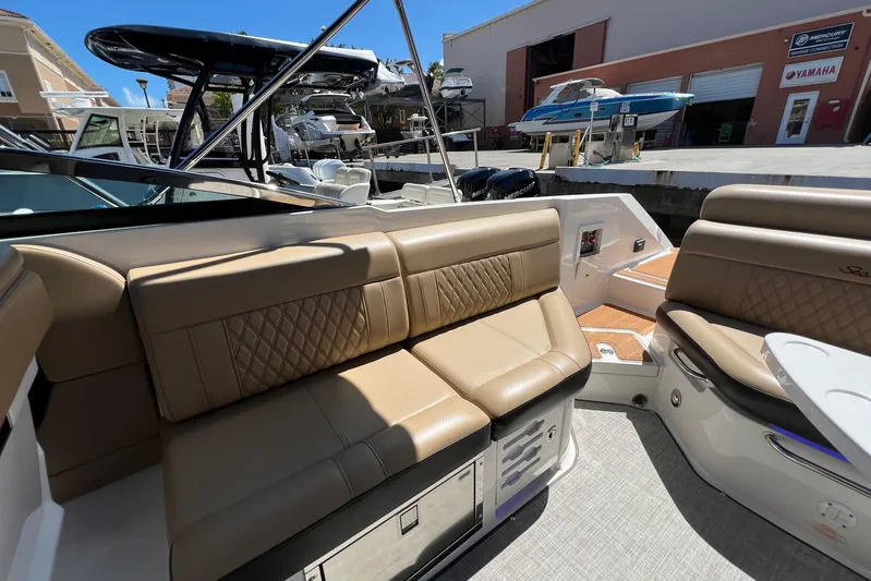 Helena Yacht Photos Pics 2020 Sea Ray 280 SLX boat interior with tan leather seating and modern design.