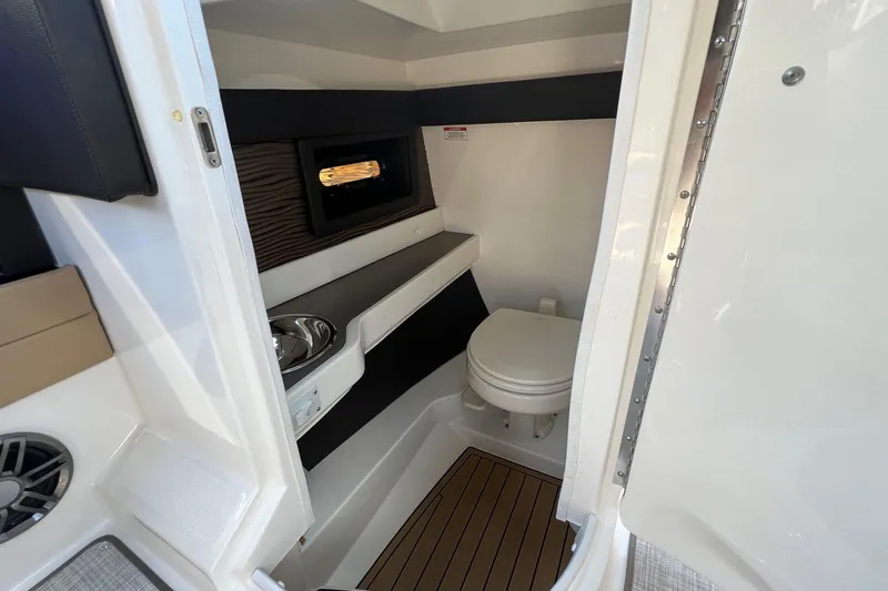 Helena Yacht Photos Pics 2020 Sea Ray 280 SLX boat interior with compact bathroom and modern amenities.
