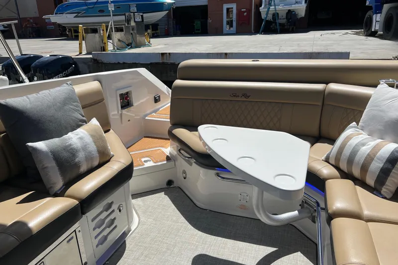 Helena Yacht Photos Pics Luxurious 2020 Sea Ray 280 SLX boat interior with plush seating and stylish table.