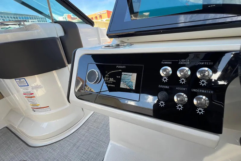 Helena Yacht Photos Pics Control panel of 2020 Sea Ray 280 SLX boat with navigation and lighting controls.