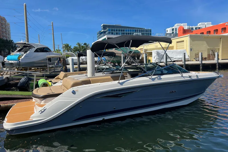 Helena Yacht Photos Pics 2020 Sea Ray 280 SLX boat docked at marina under clear blue sky.