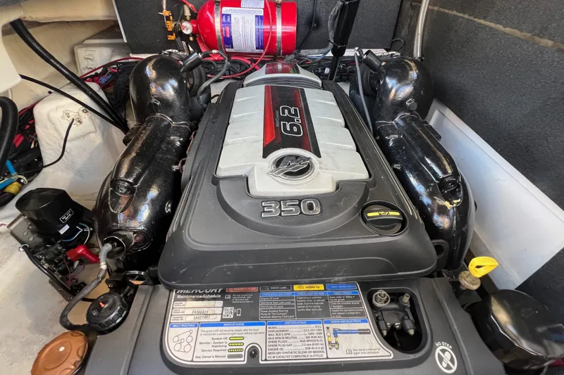 Helena Yacht Photos Pics Engine compartment of a 2020 Sea Ray 280 SLX boat, featuring a Mercury 6.2L engine.