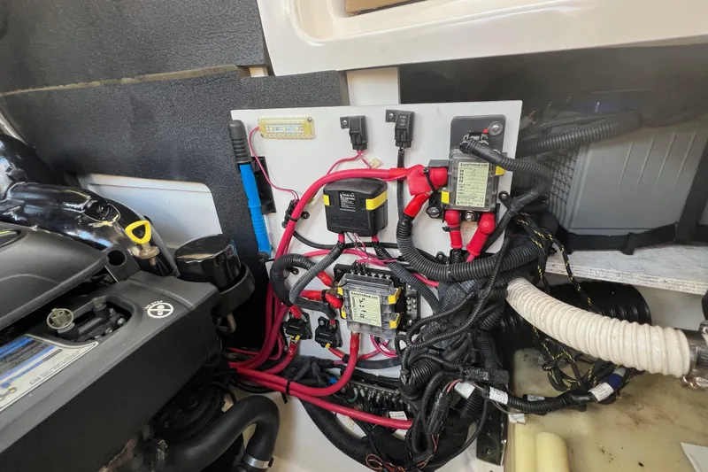 Helena Yacht Photos Pics Engine compartment of 2020 Sea Ray 280 SLX with wiring and components visible.