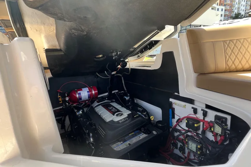 Helena Yacht Photos Pics Engine compartment of a 2020 Sea Ray 280 SLX boat, showcasing mechanical components.