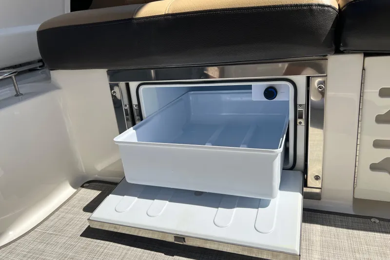 Helena Yacht Photos Pics 2020 Sea Ray 280 SLX boat interior with open storage compartment under seat.