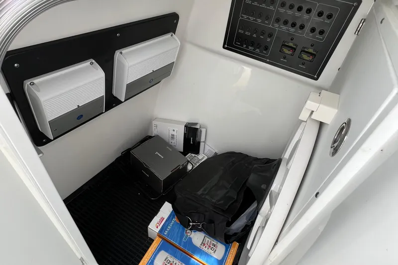 Blackfin Yacht Photos Pics 2023 Blackfin 272DC interior storage with electrical panel and equipment.