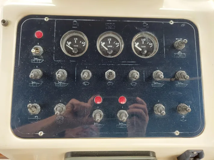 No Name Yacht Photos Pics Control panel of a 2001 Apreamare 10M Cabinato boat with gauges and switches.