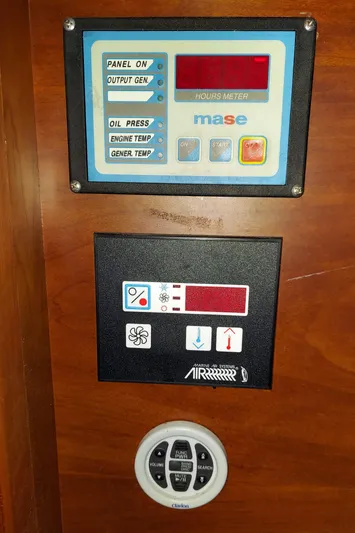 No Name Yacht Photos Pics Control panel of a 2001 Apreamare 10M Cabinato boat with various gauges and buttons.