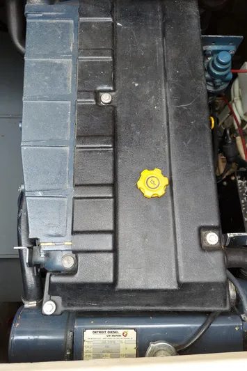 No Name Yacht Photos Pics Engine compartment of a 2001 Apreamare 10M Cabinato boat with visible components.