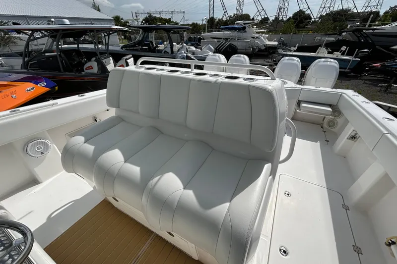  Yacht Photos Pics 2019 Invincible 40 Catamaran with white seating and spacious deck layout.