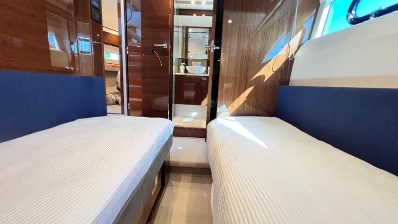  Yacht Photos Pics Luxurious 2019 Princess F62 yacht interior with twin beds and modern bathroom.