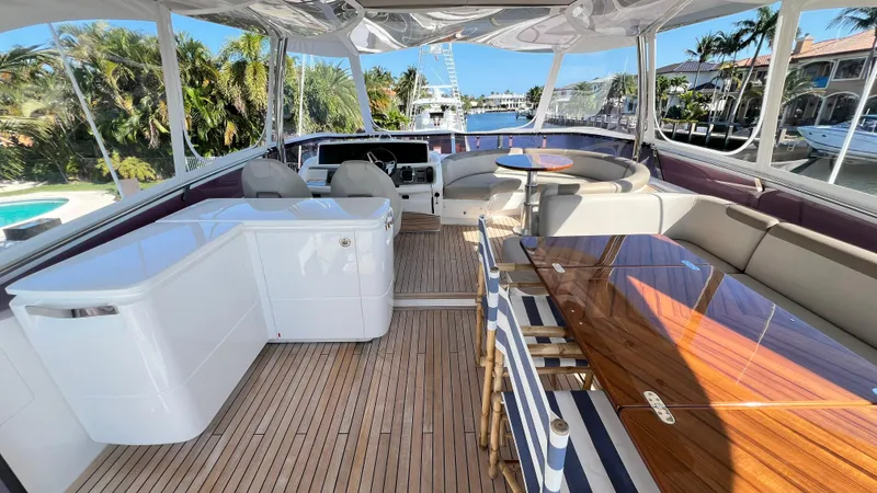  Yacht Photos Pics Luxurious 2019 Princess F62 yacht interior with elegant seating and wooden flooring.