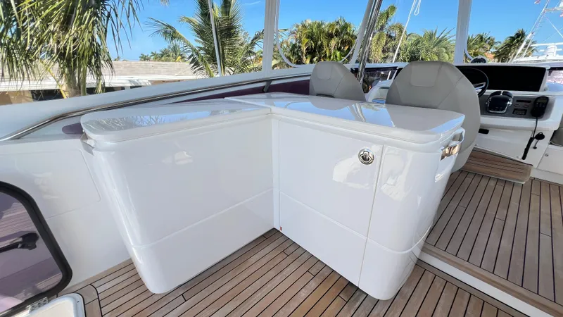  Yacht Photos Pics 2019 Princess F62 yacht helm with sleek design and wooden deck.