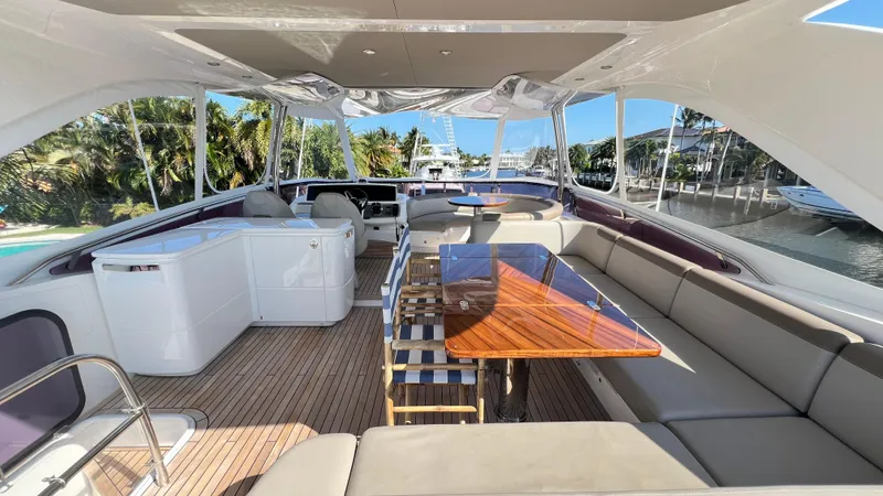  Yacht Photos Pics Luxurious 2019 Princess F62 yacht interior with elegant seating and wooden table.