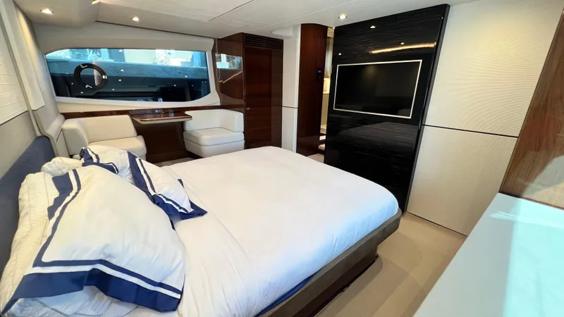  Yacht Photos Pics Luxurious 2019 Princess F62 yacht bedroom with elegant decor and modern amenities.