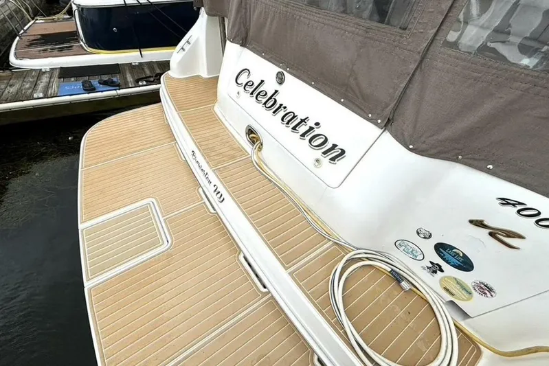  Yacht Photos Pics 1998 Sea Ray 400 Sundancer yacht with teak deck and "Celebration" nameplate.