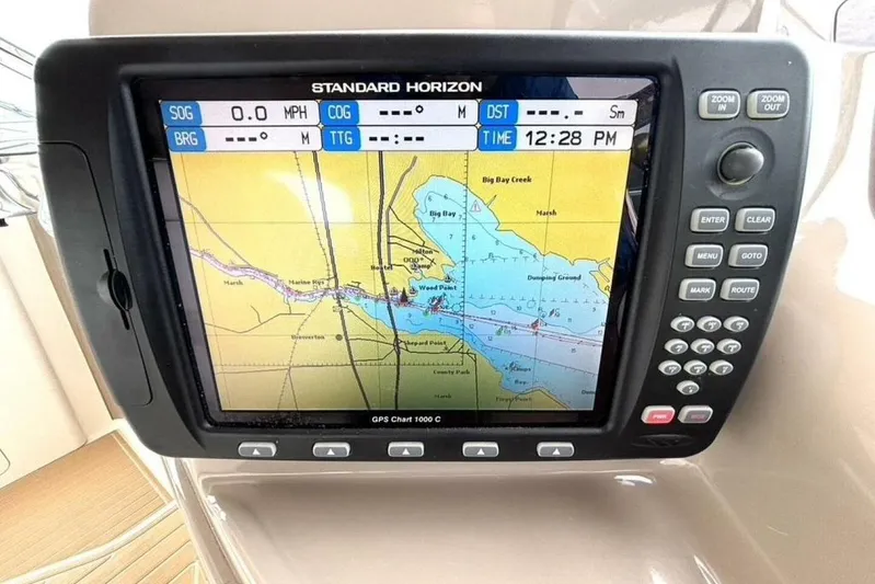  Yacht Photos Pics GPS navigation system on a 1998 Sea Ray 400 Sundancer boat dashboard.