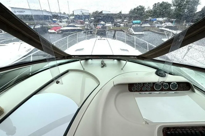  Yacht Photos Pics 1998 Sea Ray 400 Sundancer cockpit view with marina in background.