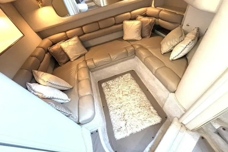  Yacht Photos Pics Luxurious interior of 1998 Sea Ray 400 Sundancer with plush seating and decorative pillows.