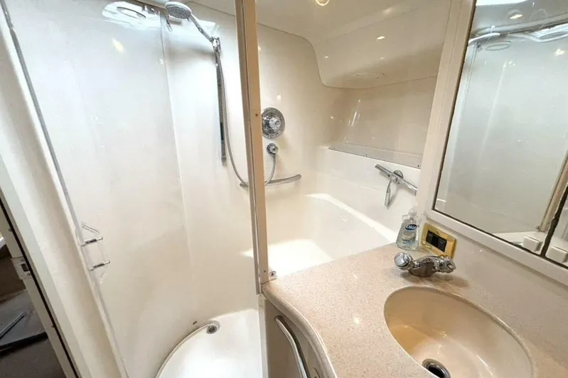  Yacht Photos Pics Bathroom interior of 1998 Sea Ray 400 Sundancer yacht with shower and sink.