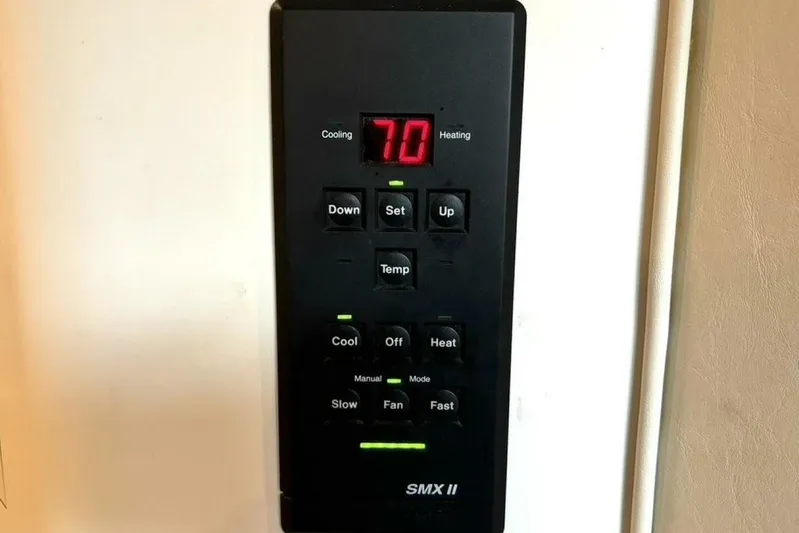  Yacht Photos Pics Control panel of a 1998 Sea Ray 400 Sundancer, displaying temperature settings.