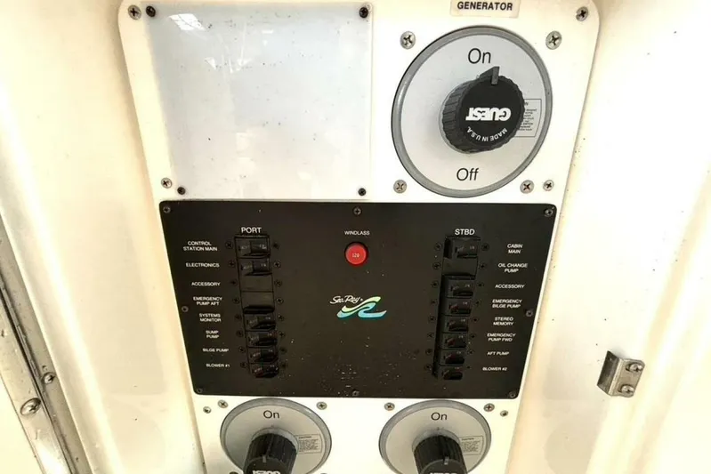  Yacht Photos Pics Control panel of a 1998 Sea Ray 400 Sundancer boat with generator switches.