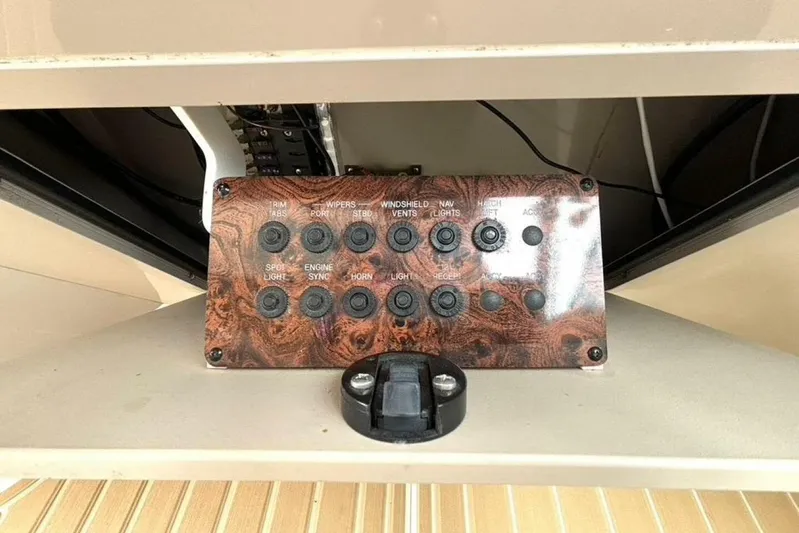  Yacht Photos Pics Control panel of a 1998 Sea Ray 400 Sundancer boat with various switches.