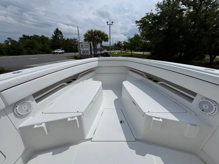 Yacht Photos Pics 2018 Jupiter 34 HFS boat interior with white seating and speakers.