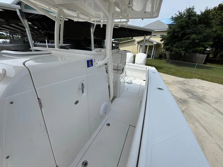  Yacht Photos Pics 2018 Jupiter 34 HFS boat, white deck, outdoor setting, side view.