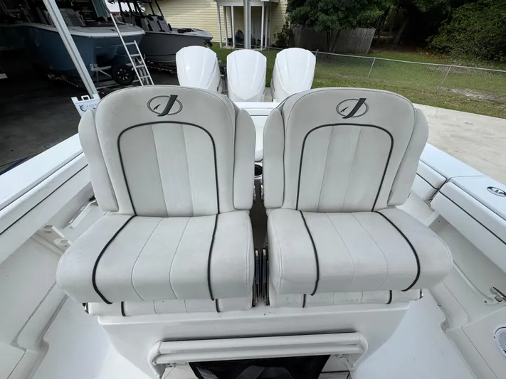  Yacht Photos Pics 2018 Jupiter 34 HFS boat with dual white cushioned seats.