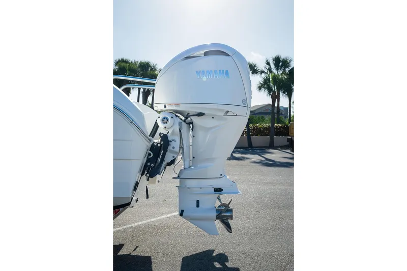  Yacht Photos Pics 2024 World Cat 295 CC with Yamaha outboard motor in a sunny outdoor setting.