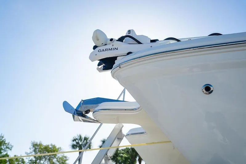  Yacht Photos Pics 2024 World Cat 295 CC boat with Garmin equipment, viewed from below against blue sky.