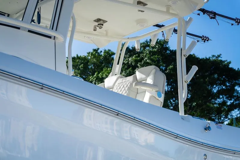  Yacht Photos Pics 2024 World Cat 295 CC boat with sleek design and comfortable seating.