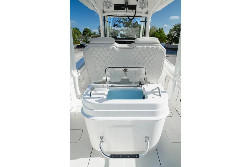  Yacht Photos Pics 2024 World Cat 295 CC boat interior with seating and storage compartment.