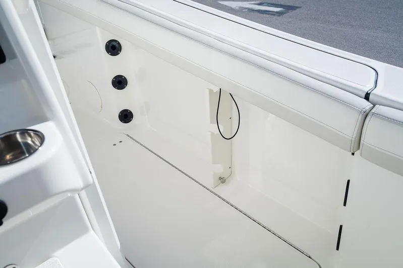  Yacht Photos Pics 2024 World Cat 295 CC boat interior, featuring sleek white seating and modern design elements.