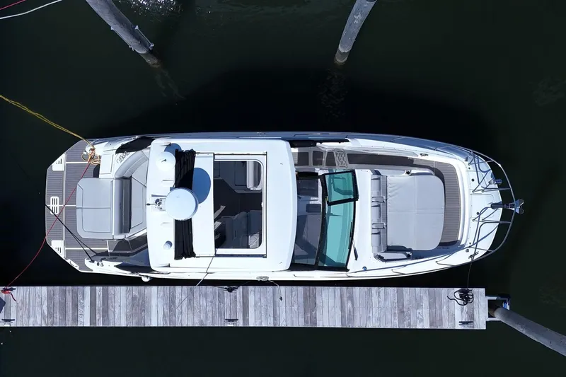  Yacht Photos Pics Overhead view of 2023 Sea Ray Sundancer 320 docked at a marina.