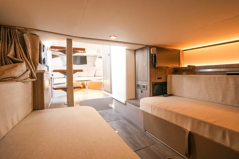  Yacht Photos Pics Interior of 2023 Sea Ray Sundancer 320 yacht, featuring cozy seating and modern design.