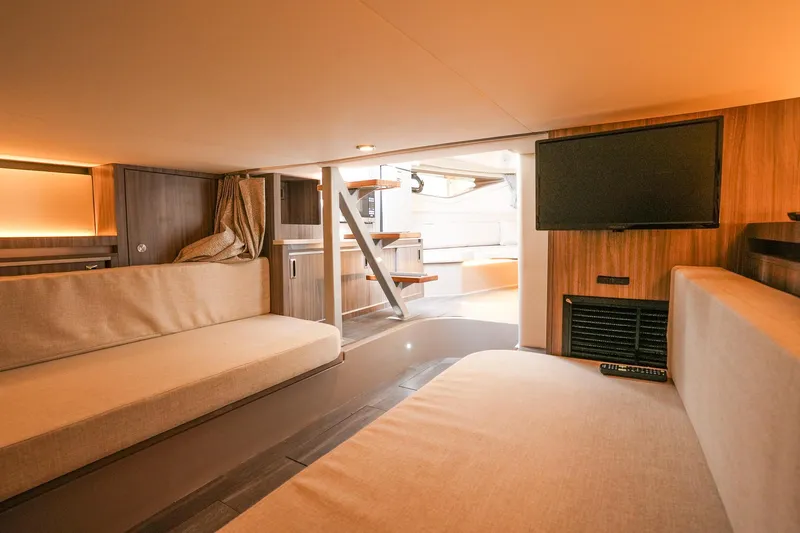  Yacht Photos Pics Interior of 2023 Sea Ray Sundancer 320 yacht, featuring cozy seating and modern amenities.