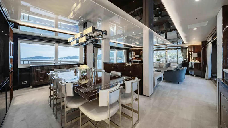  Yacht Photos Pics Luxurious interior of 2016 Sunseeker 131 Yacht with elegant dining and living areas.