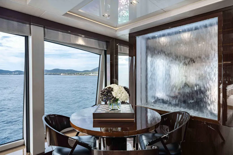  Yacht Photos Pics Luxurious Sunseeker 131 Yacht interior with elegant dining area and ocean view, 2016 model.